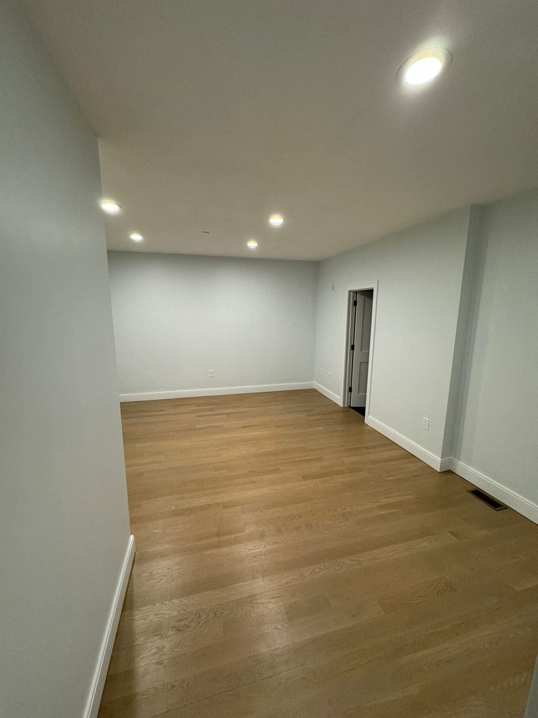 Finished Room with Hardwood Flooring