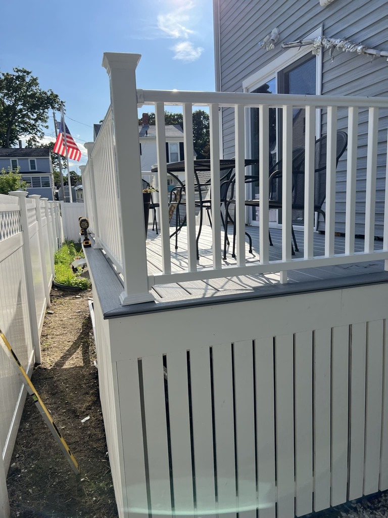 Deck with Privacy Fence and White Railings