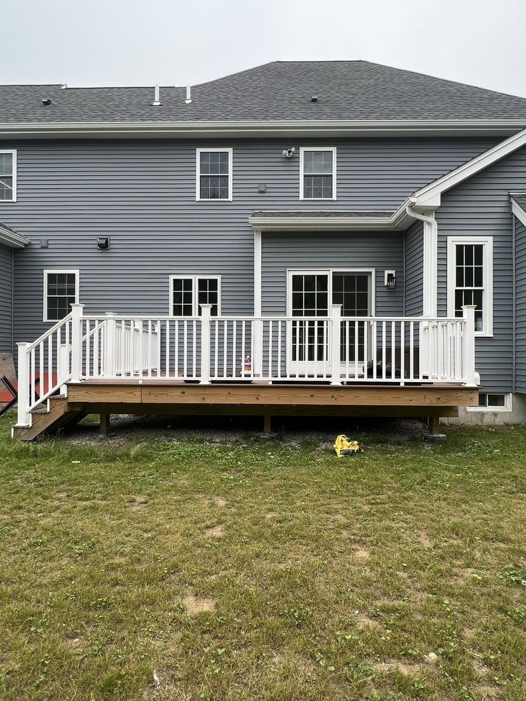 Large Deck with White Railings - Exterior View