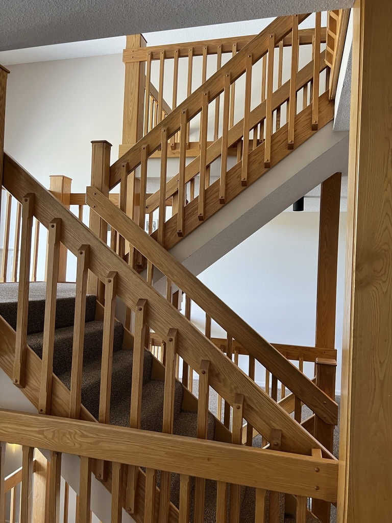 Interior Wooden Staircase with Carpet Treads