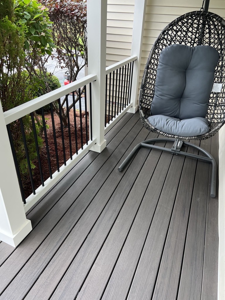 Composite Deck with Hanging Chair and Black Railings