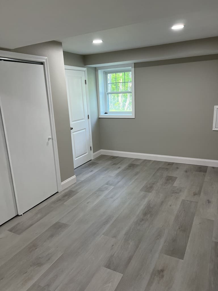 Finished Basement with Professional Door and Window Installation
